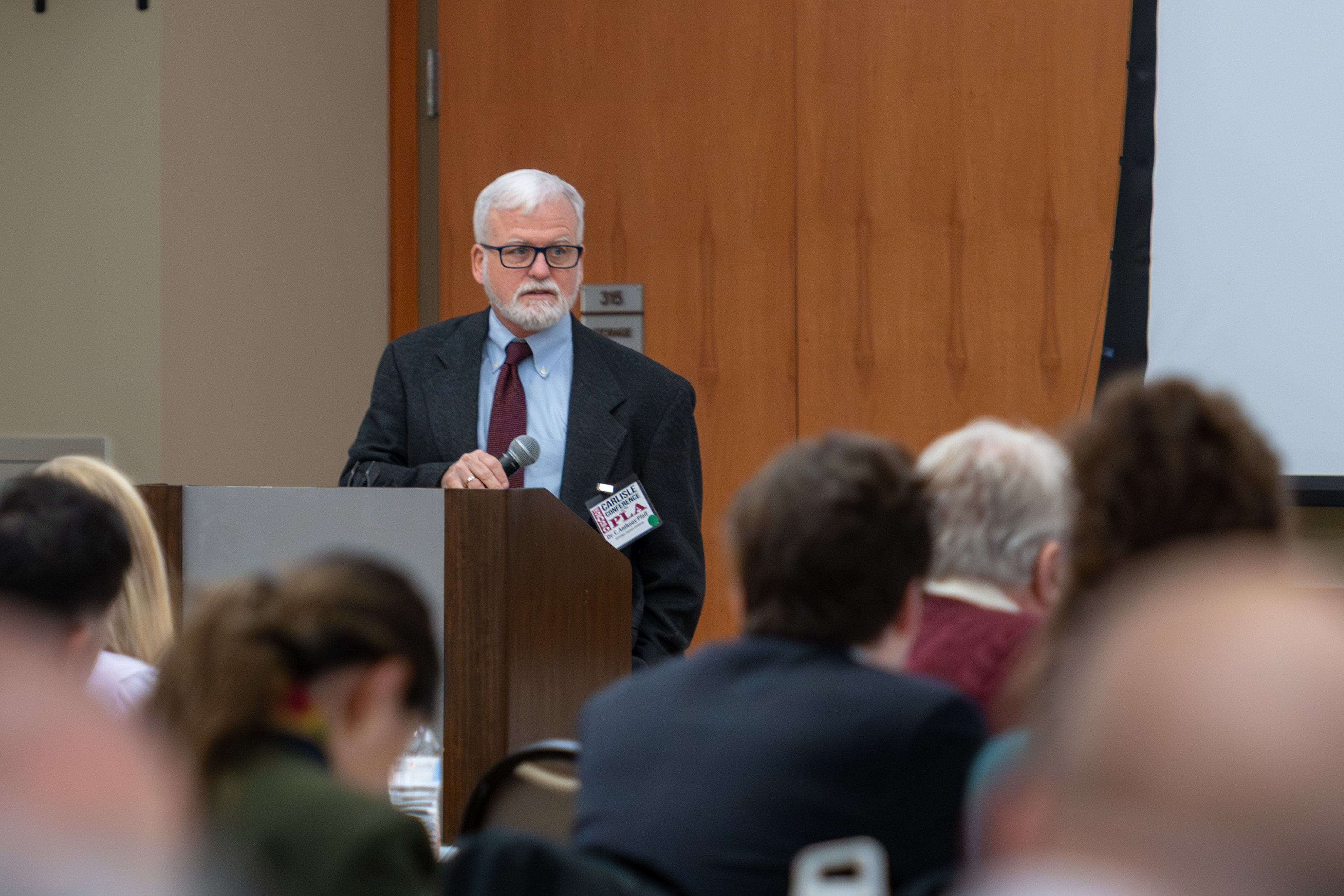 Dr. C. Anthony Pfaff, director of SSI and the USAWC Press, presents opening comments on March 25, the first day of the conference.