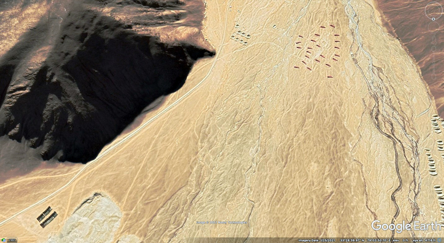Approximately 50 heavy equipment transporters parked in valley south of Spanggur Lake (in two groups, top right and lower left), January 2021 Approximately 50 heavy equipment transporters parked in valley south of Spanggur Lake (in two groups, top right and lower left), January 2021