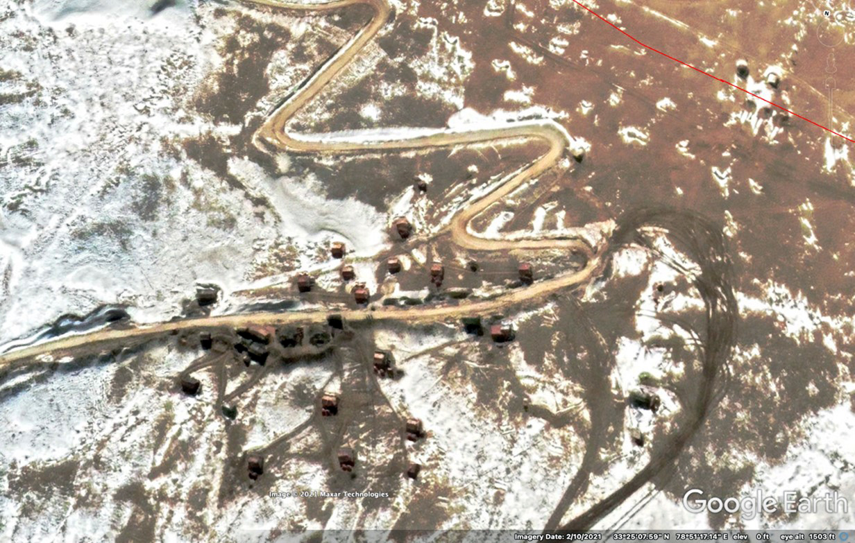 PLA outpost on LAC at Rechin La after negotiated withdrawal (note armored vehicles have left, one truck is visible, tents remain; new tank tread marks on ground), February 2021